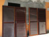 Photo for the classified Three pairs of red wood doors Saint Martin #0